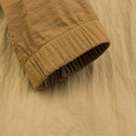 The North Face Men's Crinkle Woven Wind Jacket Khaki Stone/Utility Brown