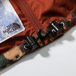 The North Face Men's M66 Utility Rain Jacket Brandy Brown Evolved Texture Print