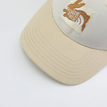 The North Face Unisex Mudder Trucker Cap Gardenia White/Gravel/CNY Patch